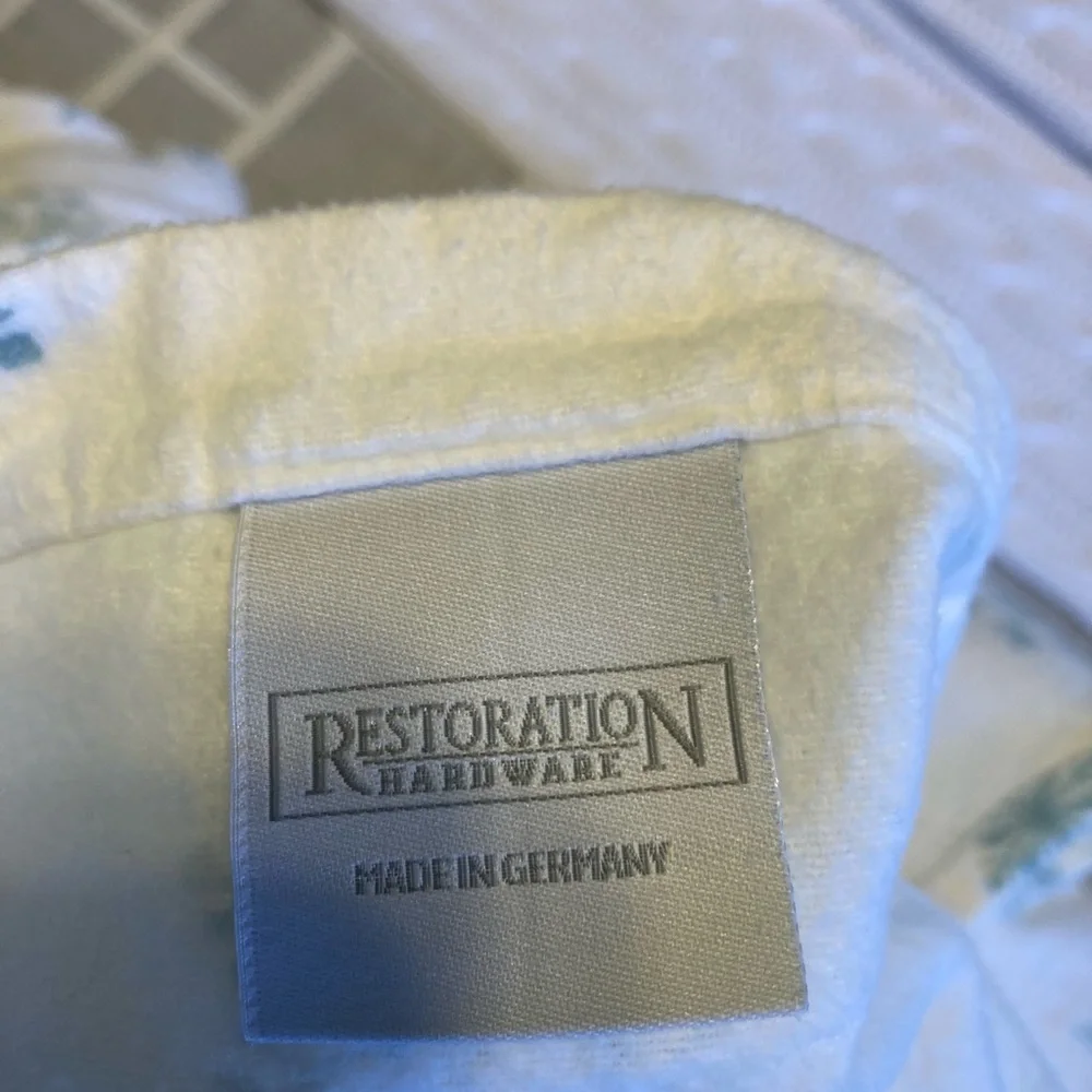 Pair of premium white flannel with turquoise snowflake design Euro shams